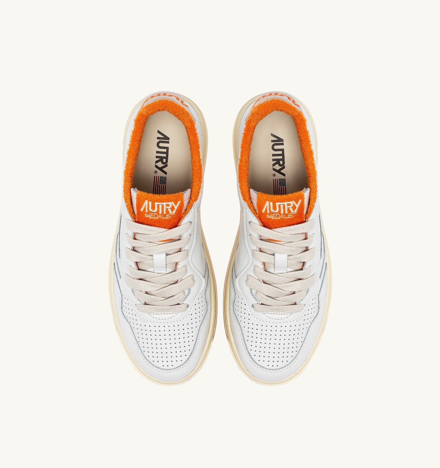 MEDALIST LOW IN PELLE BIANCO E AMBERGLOW